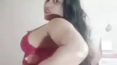 Big boob nude girl shows her butt and squeezes her boobs