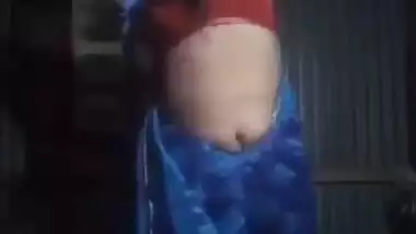 Desi bhabhi stripping saree and showing boobs