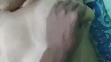 Guy lies on top of Indian teen and licks nipples to make twat wet